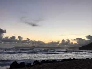 Predawn Ocean with layered clouds hinting of sunrise